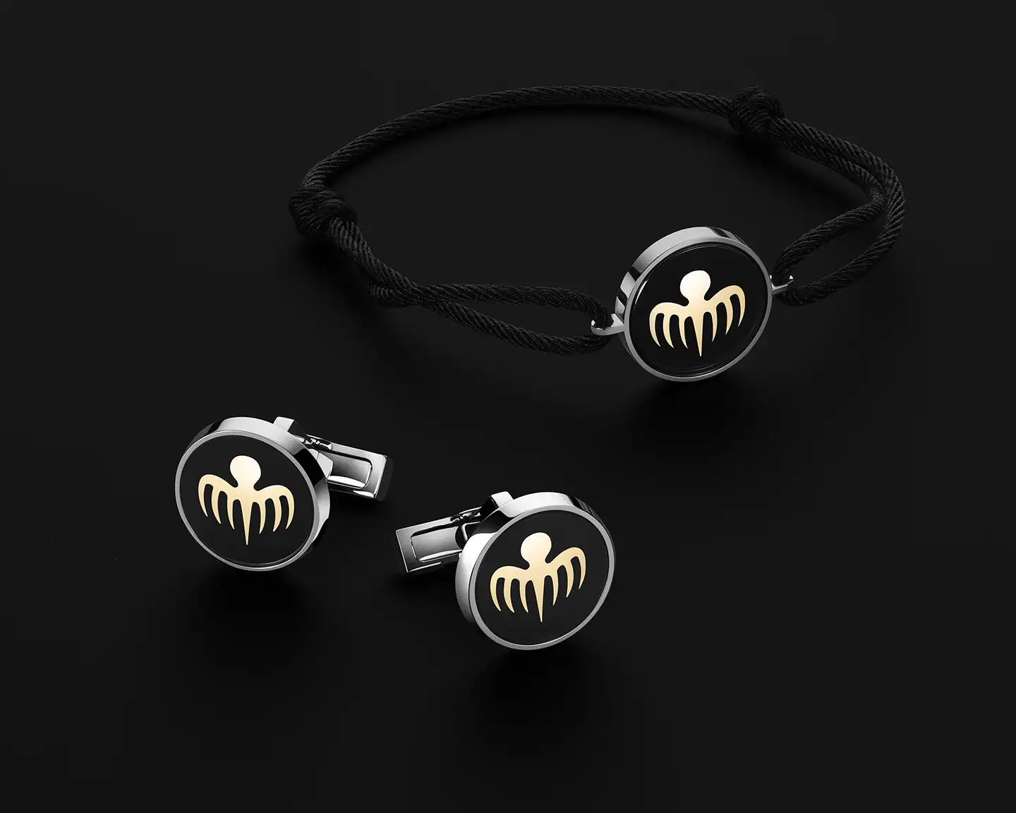 Omega Spectre - kalvosinnapit ja rannekoru.